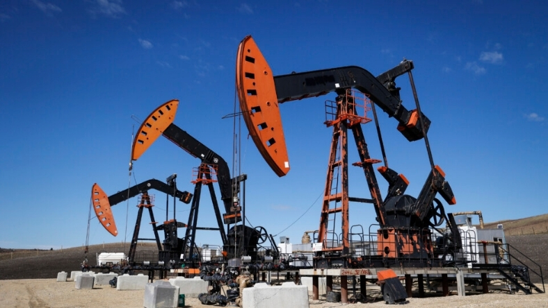 Multiple oil pumpjacks operating in an onshore oil field