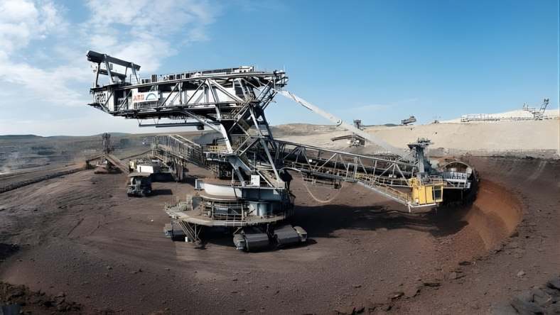 Large bucket-wheel excavator working in Alberta oil sands mine